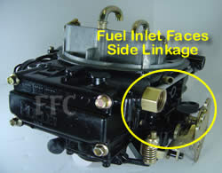 Picture of Y41-1ST four barrel Holley Model 4160 marine carburetor with fuel inlet facing the side throttle linkage